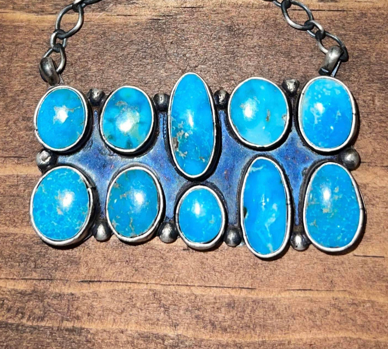 Navajo made sterling silver turquoise pendant