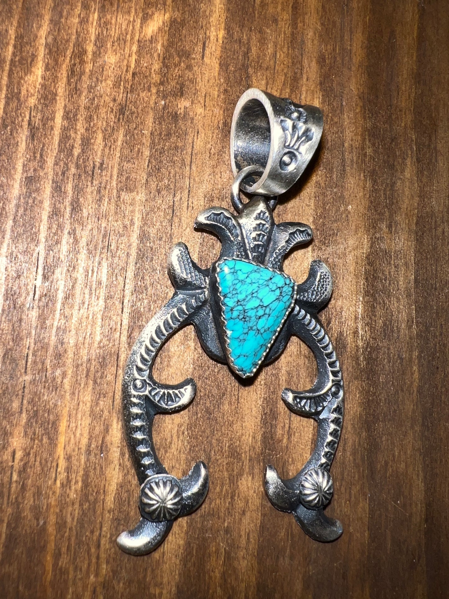 Navajo made sterling silver turquoise naja pendant