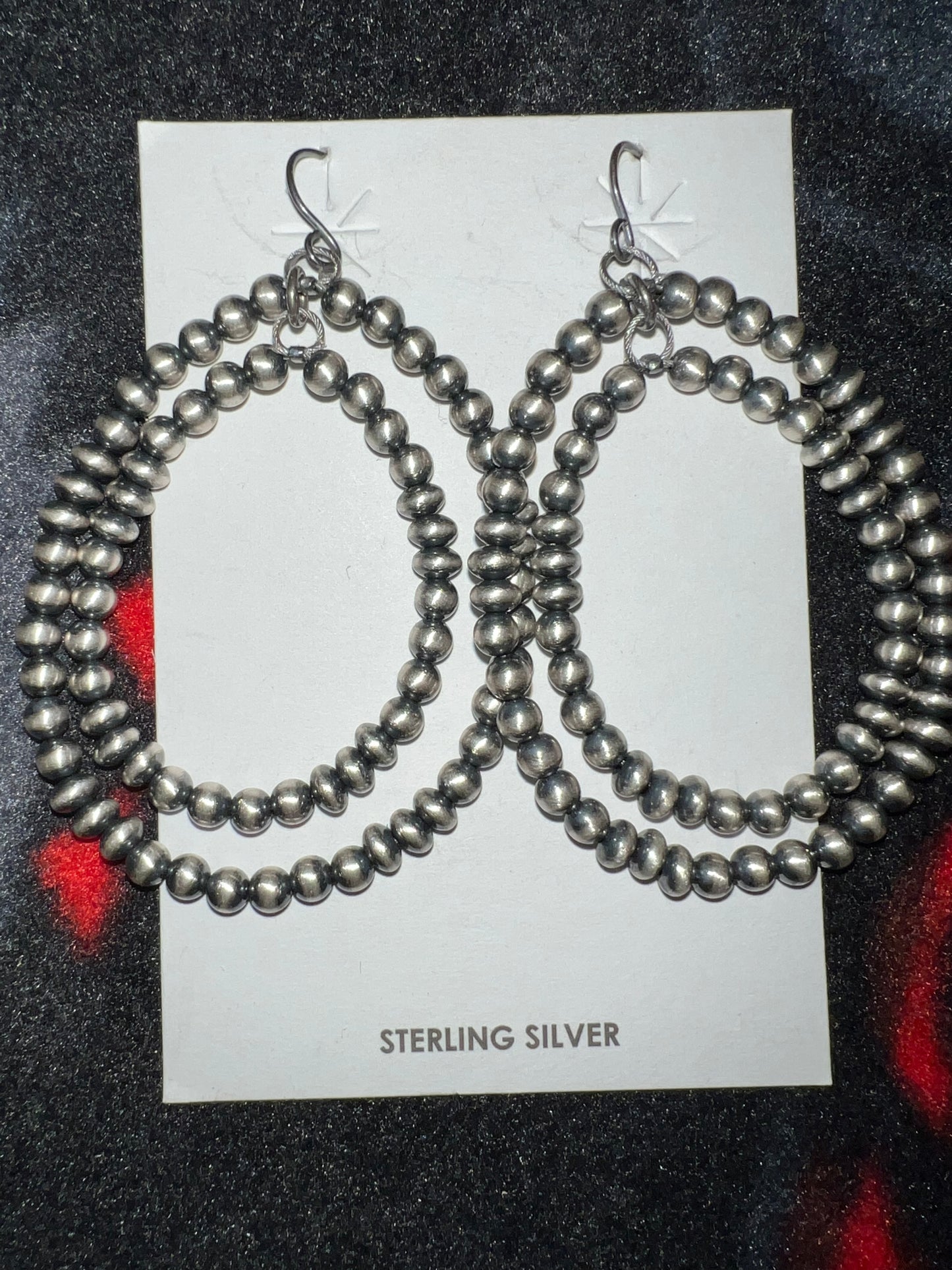 Navajo made sterling silver pearl double drop earrings