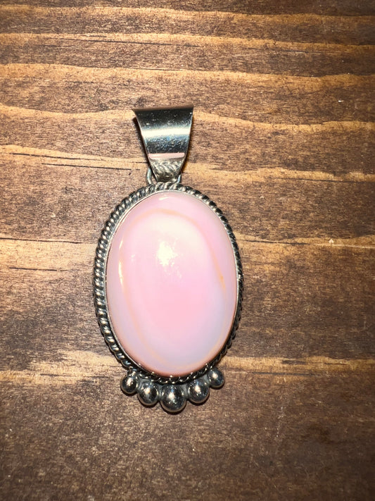 Navajo made sterling silver pink conch shell pendant