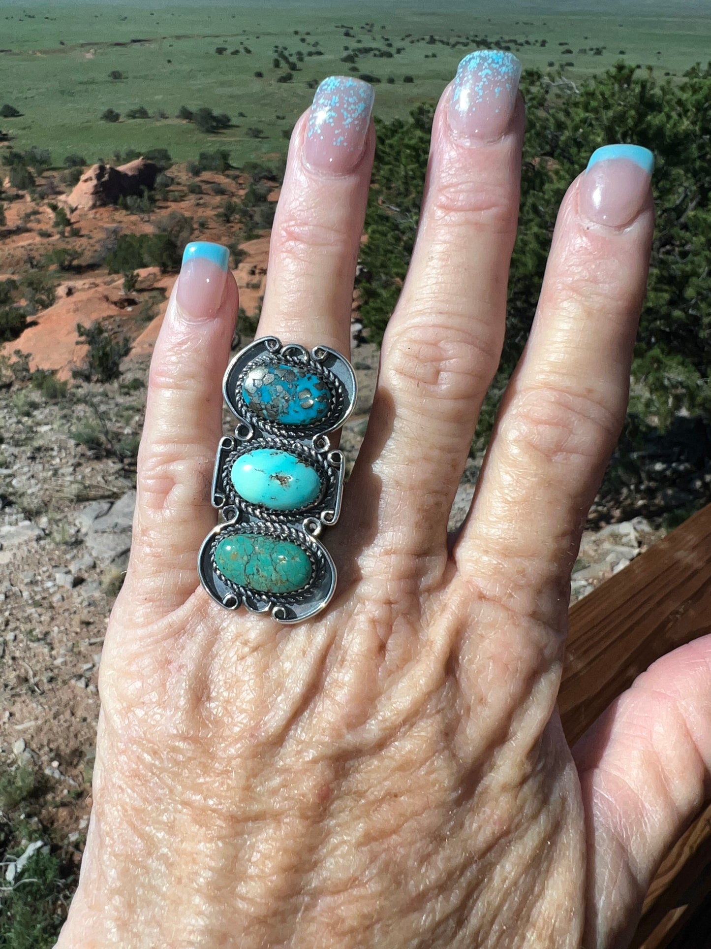 Navajo made sterling silver turquoise three stone ring