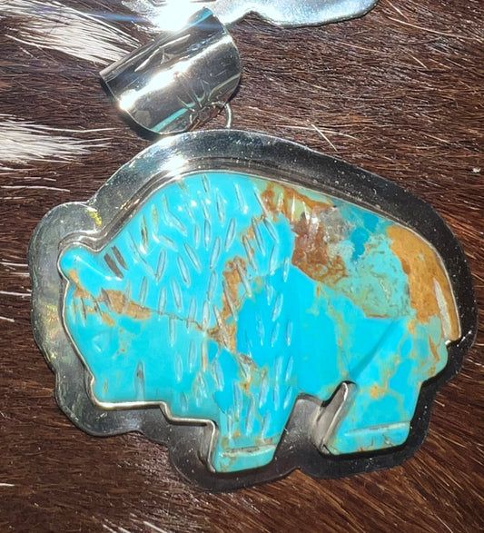 Navajo made sterling buffalo pendant