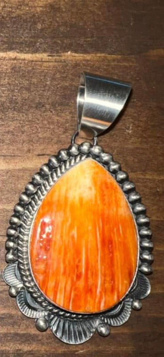 Navajo made sterling silver spiny oyster pendant